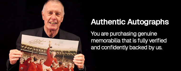 Geoff Hurst signing autographs during a private signing session