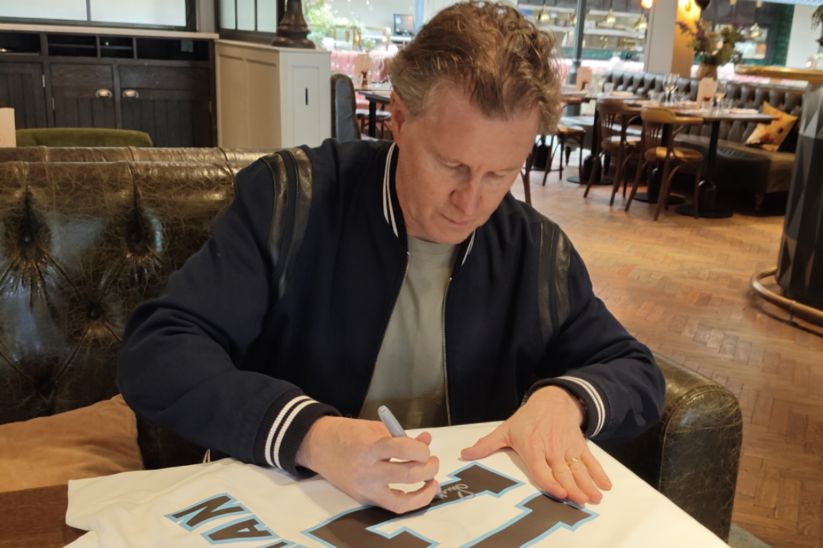 Steve McManaman signing England Euro 96 shirt for X Memorabilia in Cheshire, April 2026.